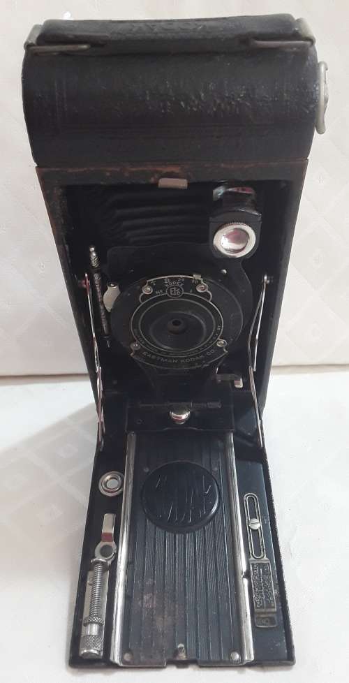 Kodak  -  Pocket Kodak in Leather bag.