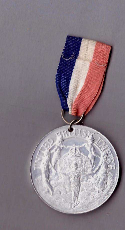 A King George VI and Queen Elizabeth "United British Empire" WITH RIBBON