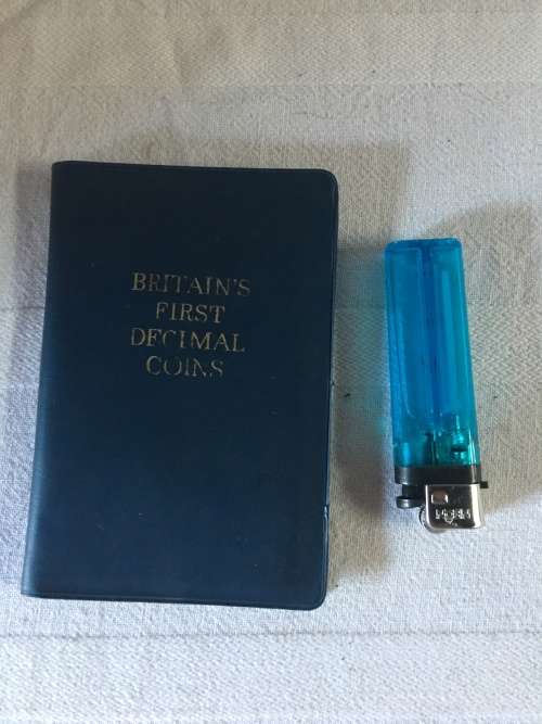 BRITAIN'S FIRST DECIMAL COINS FROM 1977 IN A COMPACT BOOKLET