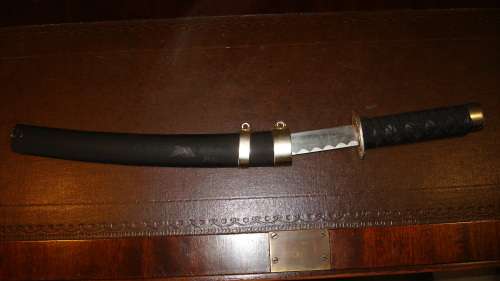 STUNNING SET OF METAL SAMURAI SWORDS ON A DISPLAY STAND