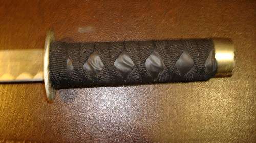 STUNNING SET OF METAL SAMURAI SWORDS ON A DISPLAY STAND