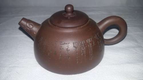 Highly Collectible Yixing Chinese vintage clay Half moon Tea Pot. 250ml. With Chinese Calligraphy.