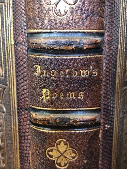 ANTIQUE HARDCOVER GILT EDGED LEATHER BOUND AND RIBBED BOOK - POEMS BY JEAN INGELOW 1867