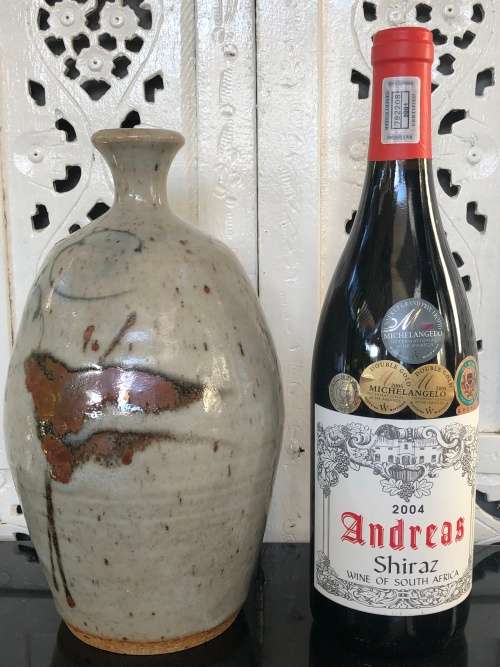 INVESTMENT ART - ANDREW WALFORD (1942 - ) A STONEWARE VASE WITH IRON AND COBALT DESIGN - SIGNED