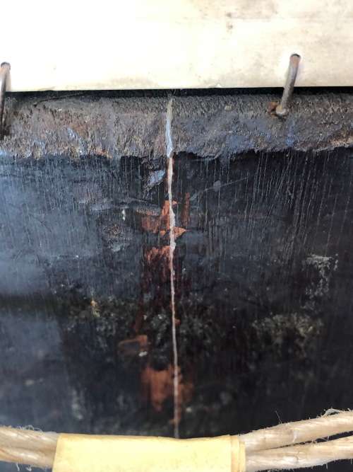 18th/19th CENTURY CONTINENTAL SCHOOL OIL PAINTING ON A WOOD PANEL - LADY WASHING HER HANDS - FRAMED