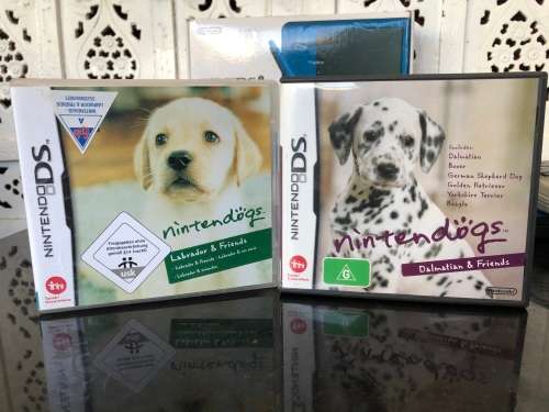 NINTENDO DSi XL GAME CONSOLE IN ORIGINAL BOX WITH CHARGER AND MANUAL FULL WORKING ORDER WITH 2 GAMES