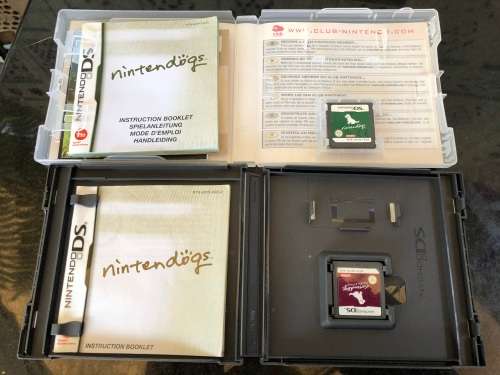 NINTENDO DSi XL GAME CONSOLE IN ORIGINAL BOX WITH CHARGER AND MANUAL FULL WORKING ORDER WITH 2 GAMES