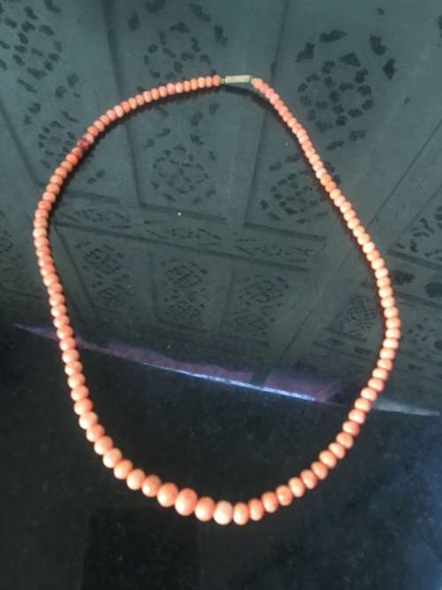 Genuine Natural Antique Salmon Coral Beaded Necklace with gold clip in clasp.