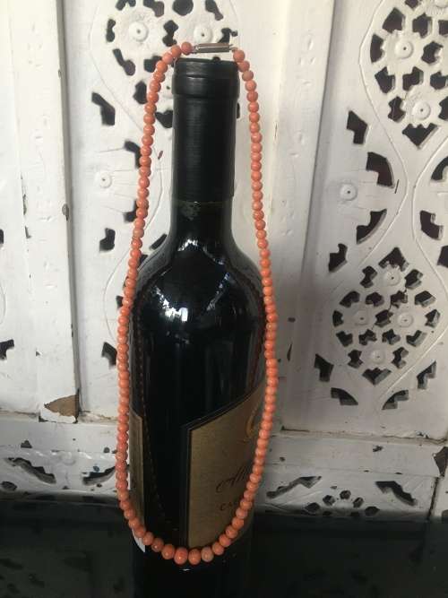 Genuine Natural Antique Salmon Coral Beaded Necklace with gold clip in clasp.
