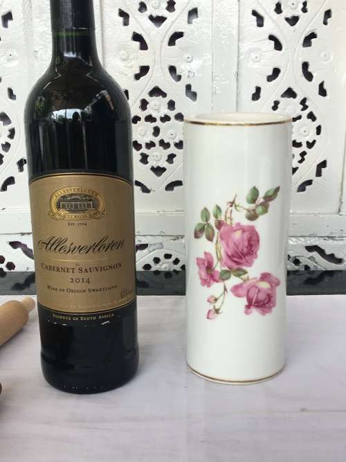 Vintage Porelain Floral Rolling Pin with detachable wooden handles. Numbered 13683