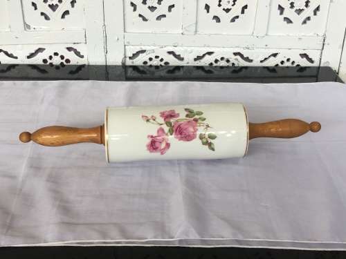 Vintage Porelain Floral Rolling Pin with detachable wooden handles. Numbered 13683