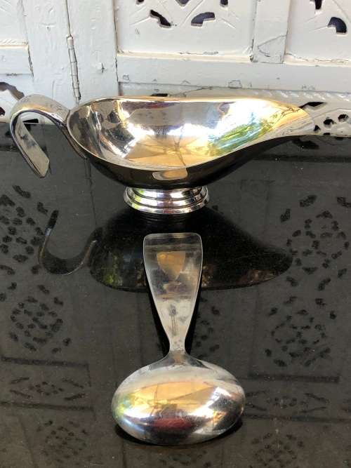 WOW !!! CARROL BOYES FUNCTIONAL ART !!! STAINLESS GRAVY BOAT AND MATCHING LADLE - CLEARLY MARKED