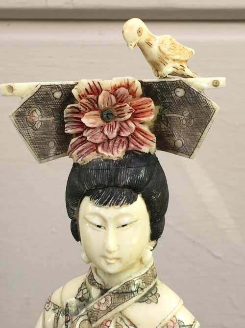Japanese Bone Geisha figurine sculpted hand decorated. 28 cm tall  moving arm and bird