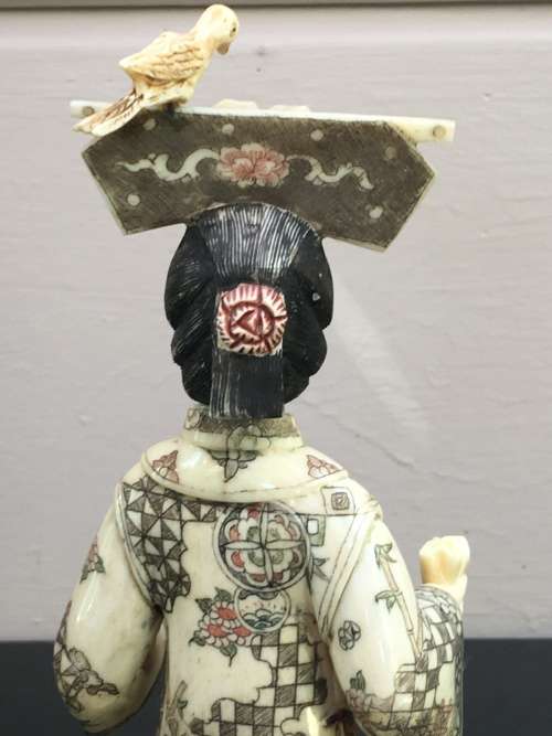 Japanese Bone Geisha figurine sculpted hand decorated. 28 cm tall  moving arm and bird