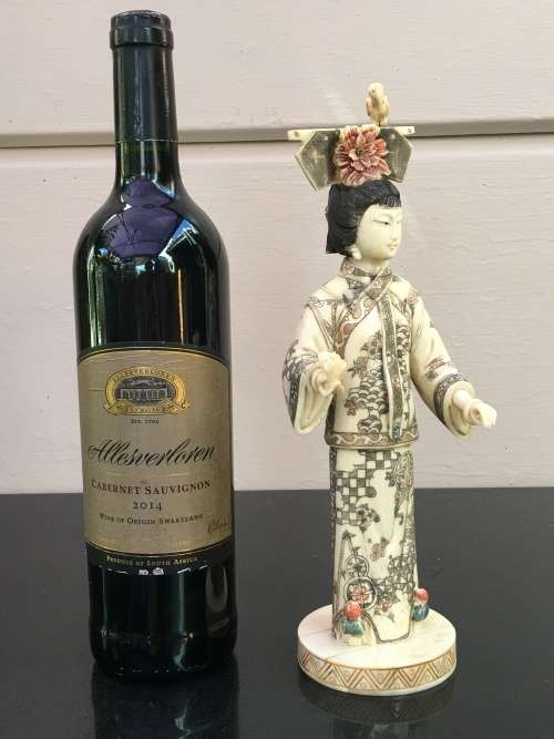 Japanese Bone Geisha figurine sculpted hand decorated. 28 cm tall  moving arm and bird