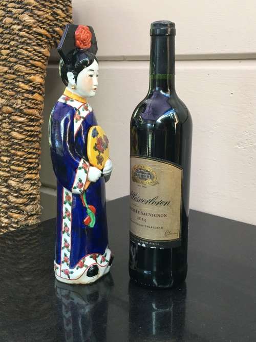 Antique Signed Oriental female porcelain figurine hand sculpted and decorated. (Incense burner)