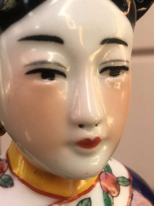 Antique Signed Oriental female porcelain figurine hand sculpted and decorated. (Incense burner)
