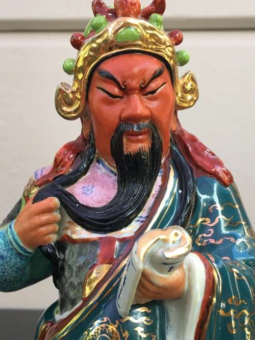 Vintage Signed Chinese Shiwan male figurine hand sculpted and decorated.