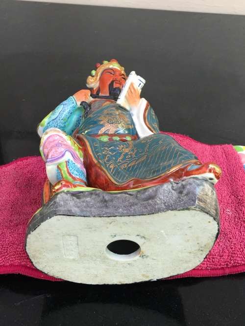 Vintage Signed Chinese Shiwan male figurine hand sculpted and decorated.