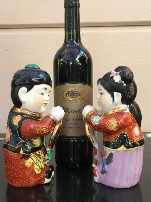 Vintage Chinese Shiwan twin girl and boy figurine hand decorated. 20 cm tall