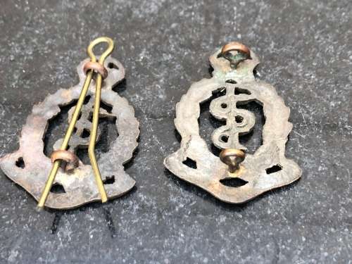 Pair of South African WW1 Royal Army Medical Corps Collar Badges