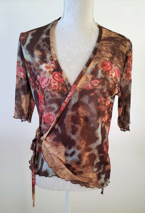 Cross-over floral top in a size M
