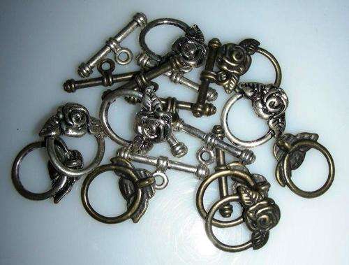 10 x Rose & toggle clasps - assorted silver and bronze tone