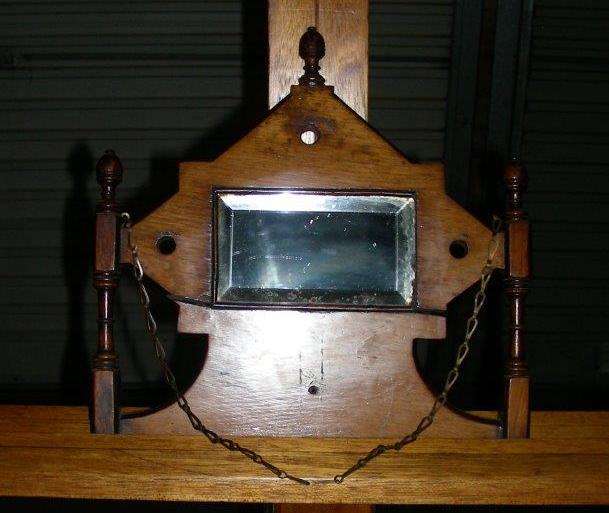 Vintage wooden mirror on a chain - unusual shape - very nice