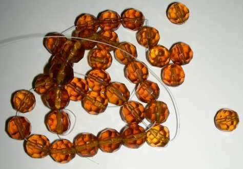 1 X strand of Amber facetted round 8mm glass beads