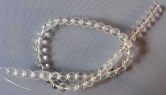 1 x strand of Clear smooth round 6mm glass beads - so versatile !