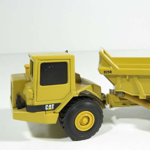 ERTL Caterpillar D25D articulated dump truck die-cast construction model - Scale 1/64