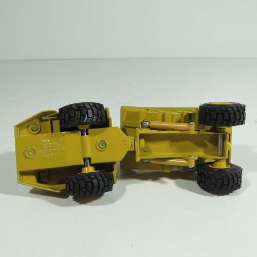 ERTL Caterpillar D25D articulated dump truck die-cast construction model - Scale 1/64