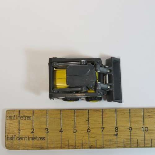 ERTL New Holland LS170 skid steer loader model - Scale 1/64