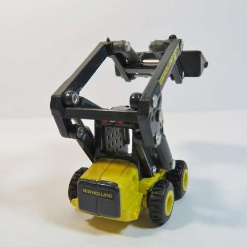 ERTL New Holland LS170 skid steer loader model - Scale 1/64