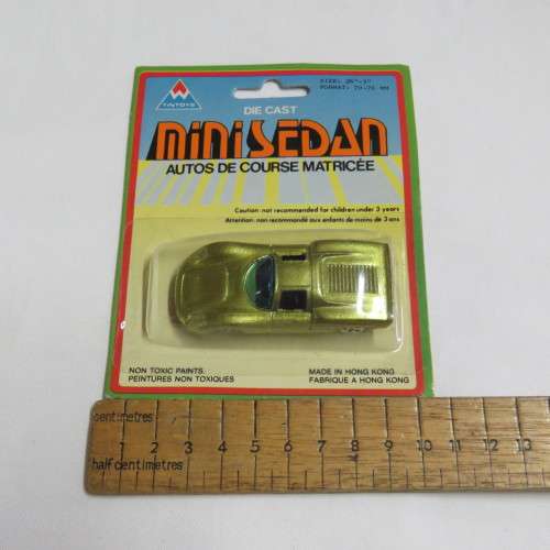 Vintage TinToys die cast mini sedan toy car in pack