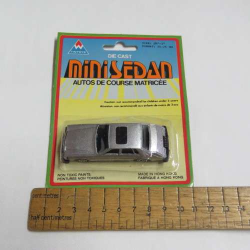 Vintage TinToys die cast mini sedan toy car in pack