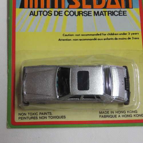Vintage TinToys die cast mini sedan toy car in pack