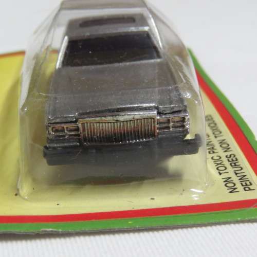 Vintage TinToys die cast mini sedan toy car in pack