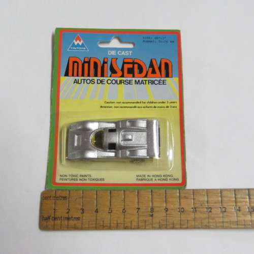 Vintage TinToys die cast mini sedan toy car in pack