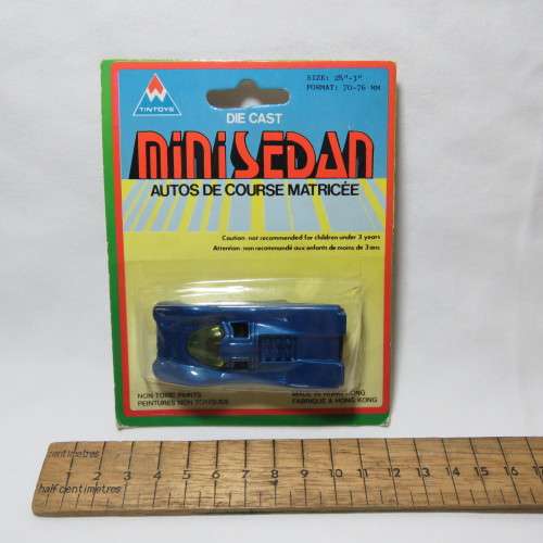 Vintage Tin Toys die cast mini Sedan toy car in pack