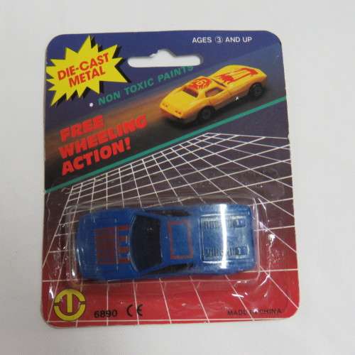 Vintage Die cast metal Free Wheeling action toy car in pack