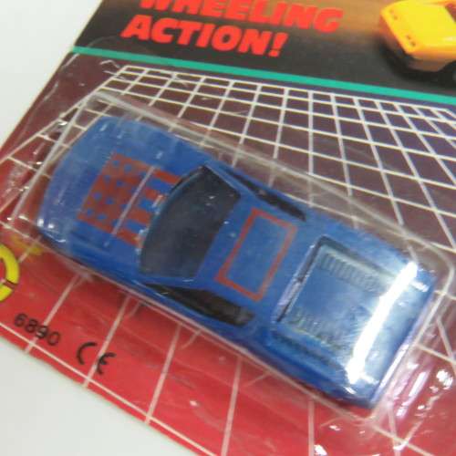 Vintage Die cast metal Free Wheeling action toy car in pack