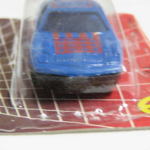 Vintage Die cast metal Free Wheeling action toy car in pack