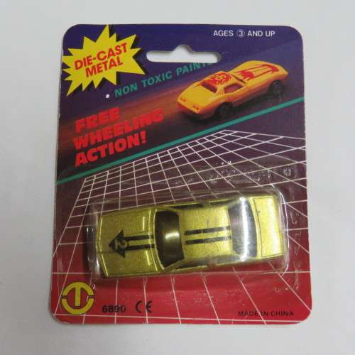 Vintage Free Wheeling Action die cast metal toy car in pack