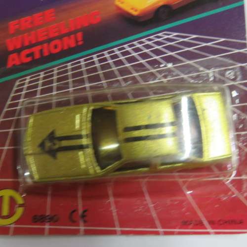 Vintage Free Wheeling Action die cast metal toy car in pack