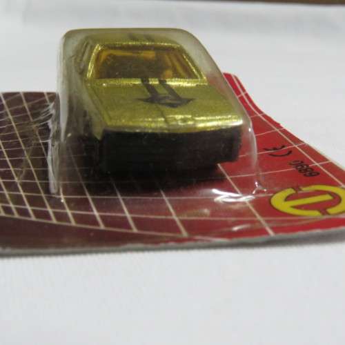Vintage Free Wheeling Action die cast metal toy car in pack