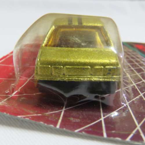 Vintage Free Wheeling Action die cast metal toy car in pack