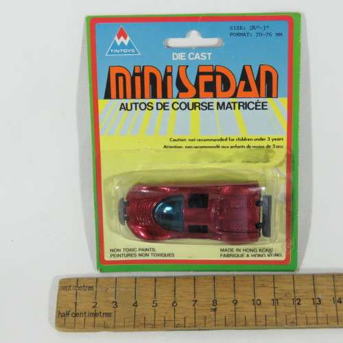 Vintage TinToys die cast mini sedan toy car