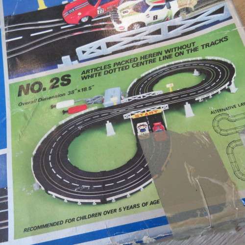 Box with parts for Speedtrax slot car battery operated set - Only 1 car and controller