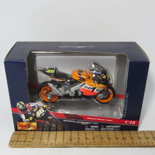 Maisto 2003 Honda RCV 211 Repsol MotoGP die-cast motorcycle - #46 Valentino Rossi - Scale 1/18